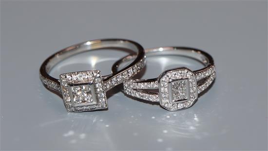 Two modern white metal and diamond set dress rings, including 18k round brilliant and square cut, sizes M/N & O.